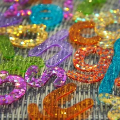 Kirjaimet glitterillä, 26 kpl