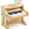 Puinen piano elektronisella äänellä